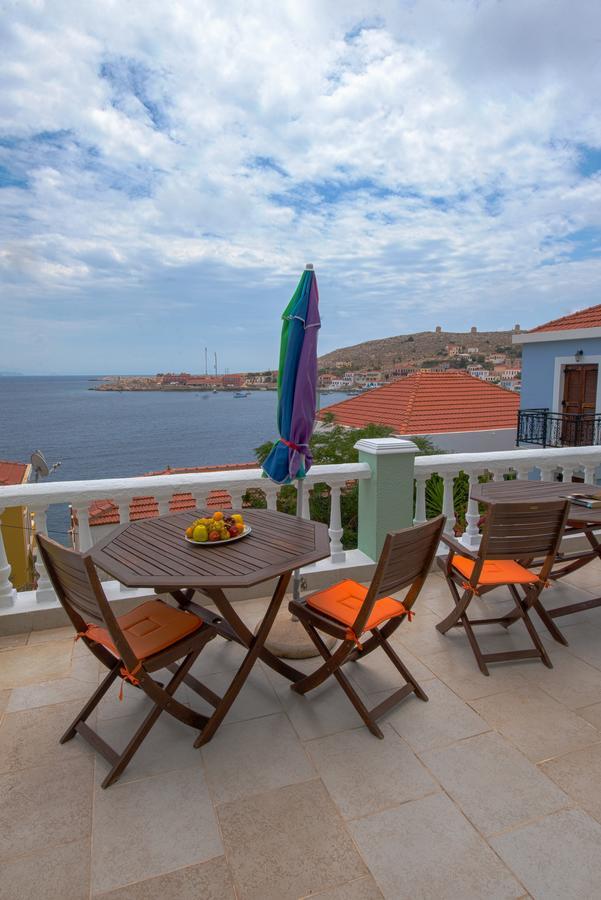 Roulas Apartments Chalki Town Exterior photo