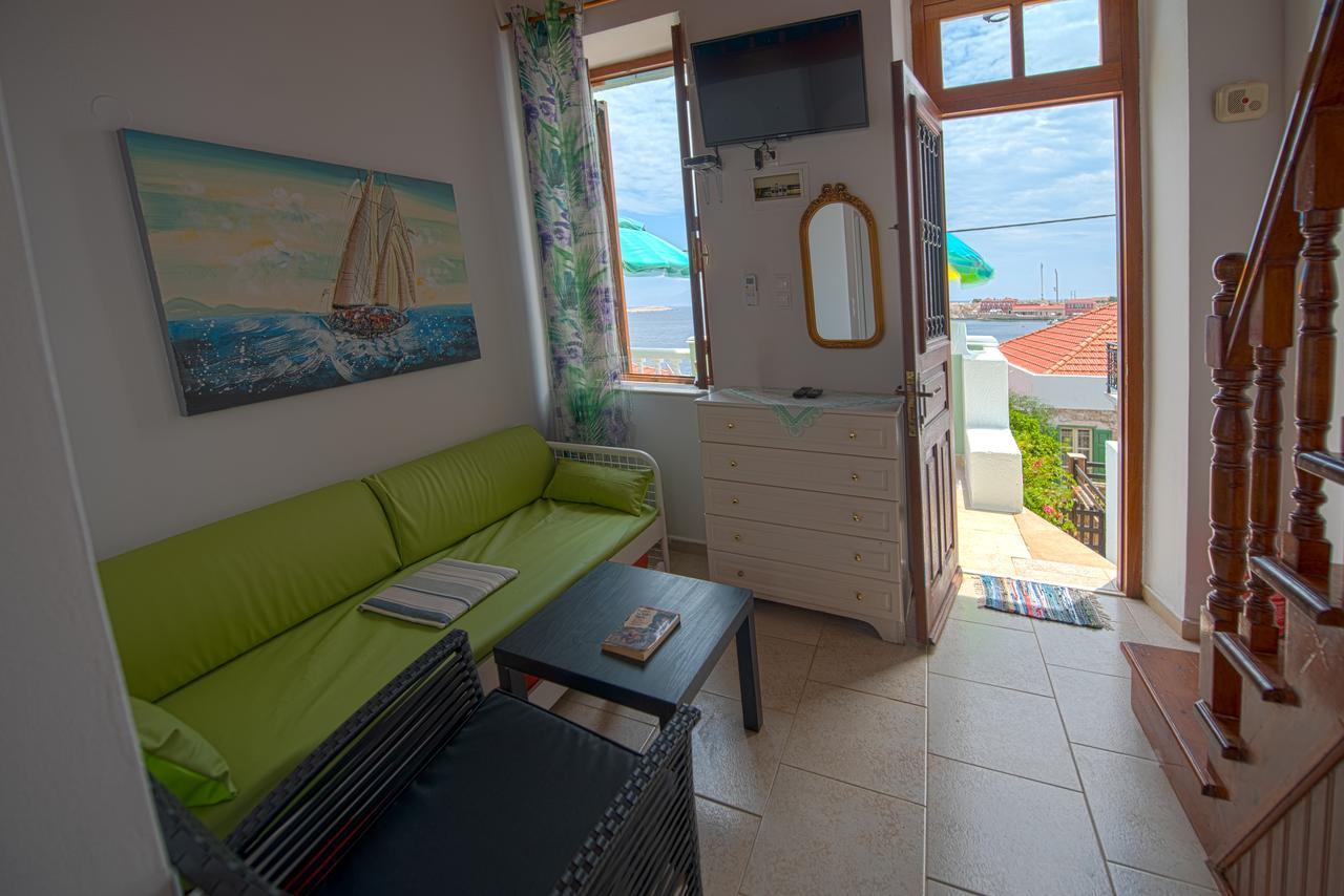 Roulas Apartments Chalki Town Exterior photo