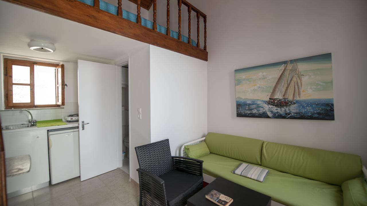 Roulas Apartments Chalki Town Exterior photo