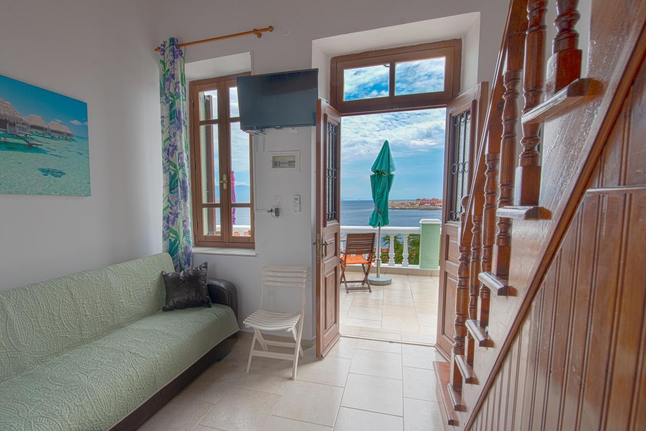 Roulas Apartments Chalki Town Exterior photo